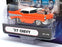 Muscle Machines 1/64 Scale 71161 01-74 - 1957 Chevrolet Chevy - Orange/White