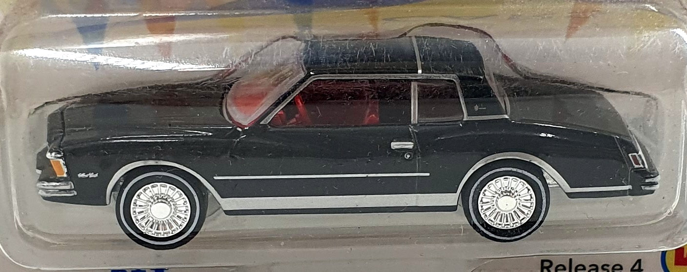 Johnny Lightning 1/64 JLMC028 - 1978 Chevrolet Monte Carlo - Black/Red Interior