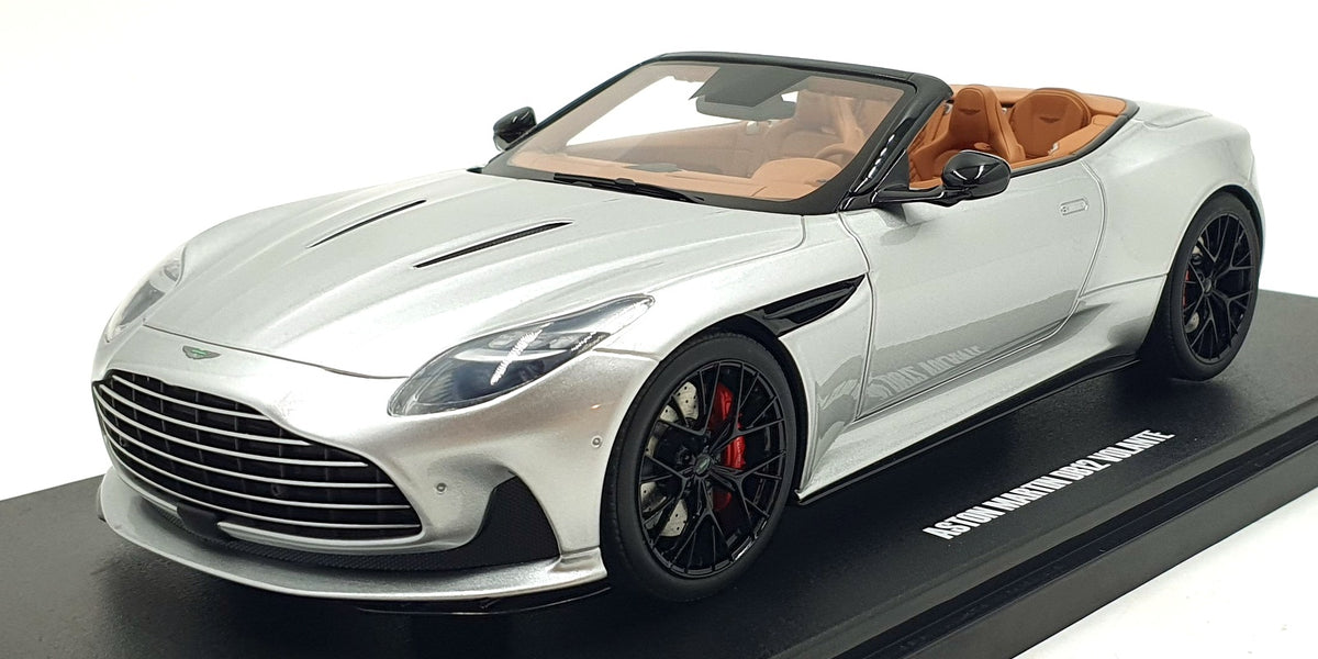 Flowers and a model car. Aston Martin DB12 (GT-SPIRIT 1:18 scale