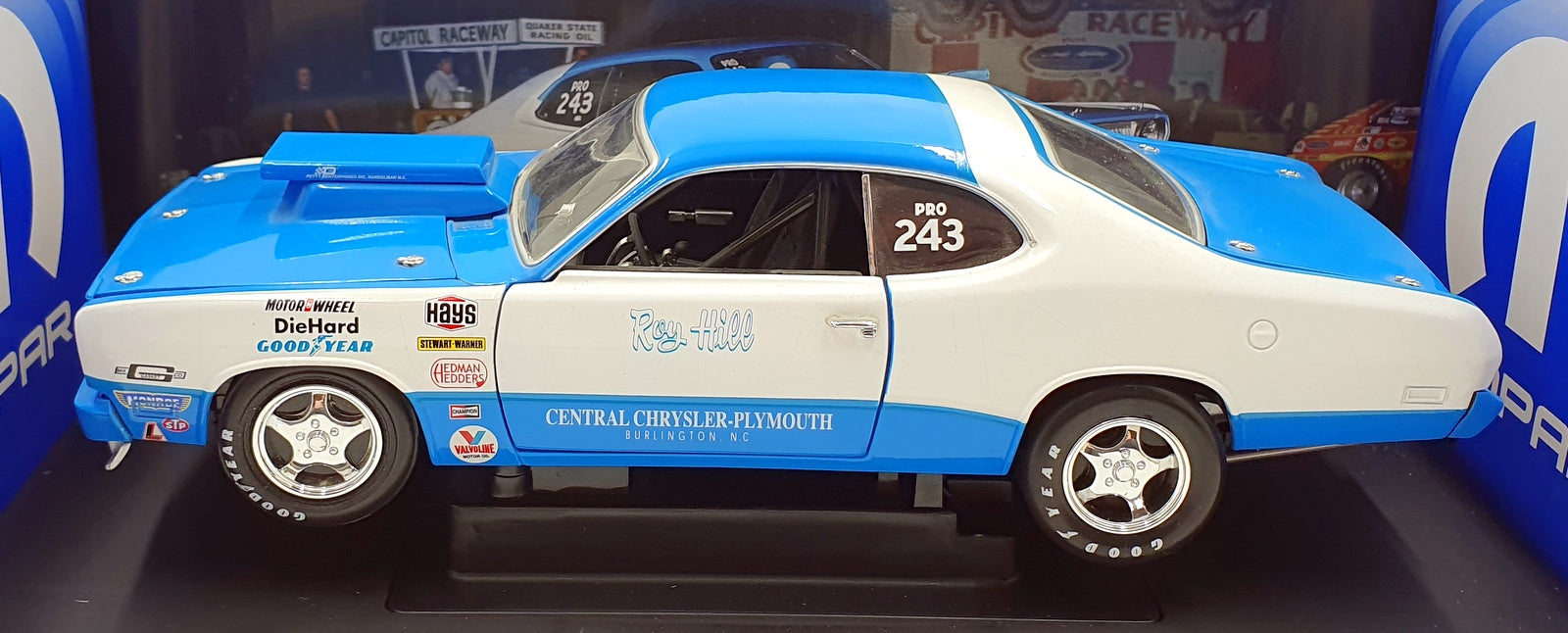 Ertl 1/18 Scale Diecast 29328P - 1972 Plymouth Duster Roy Hill - White/Blue
