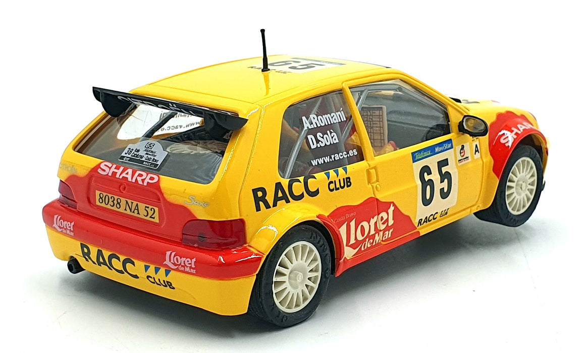 Ninco 1/32 Scale Slot Car 50266 - Citroen Saxo JWRC #65 "RACO" D.Sola