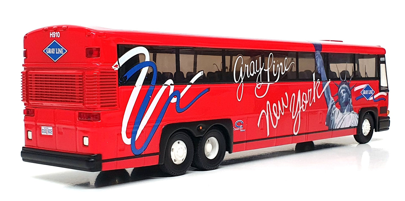 Corgi 1/50 Scale US53409 - MCI 102 DLS Gray Coach Lines New York - Red/White