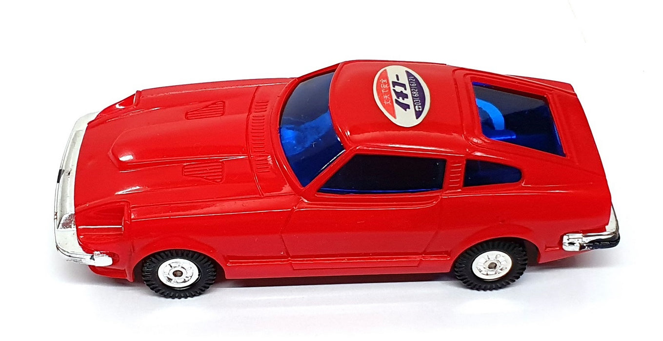 Ichiko Japan 11.5cm Long Model M222 - Nissan Toy Car With Sound - Red