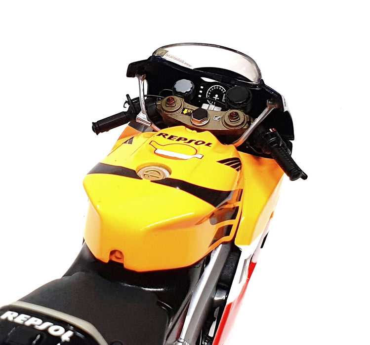 Minichamps 1/12 Scale 122 041004 - Honda RC211V Repsol #4 MotGP 2004 A. Barros