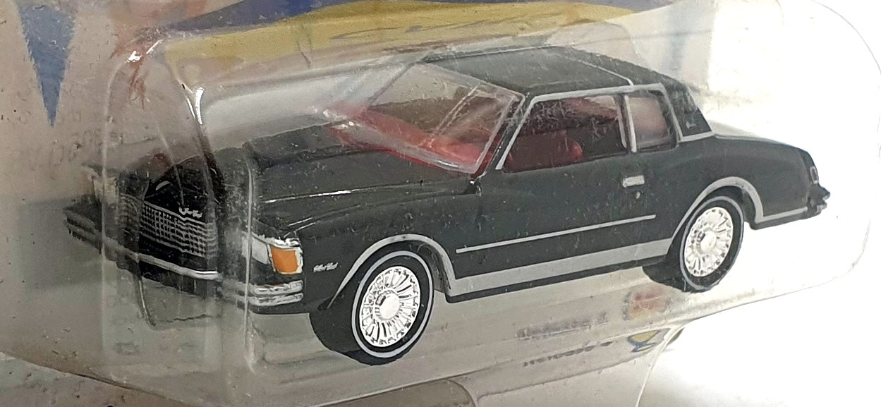 Johnny Lightning 1/64 JLMC028 - 1978 Chevrolet Monte Carlo - Black/Red Interior