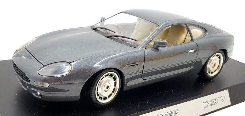 A collection of seven 1:18 scale diecast model cars by Guiloy, AutoArt