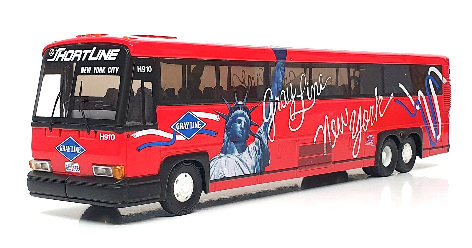 Corgi 1/50 Scale US53409 - MCI 102 DLS Gray Coach Lines New York - Red/White