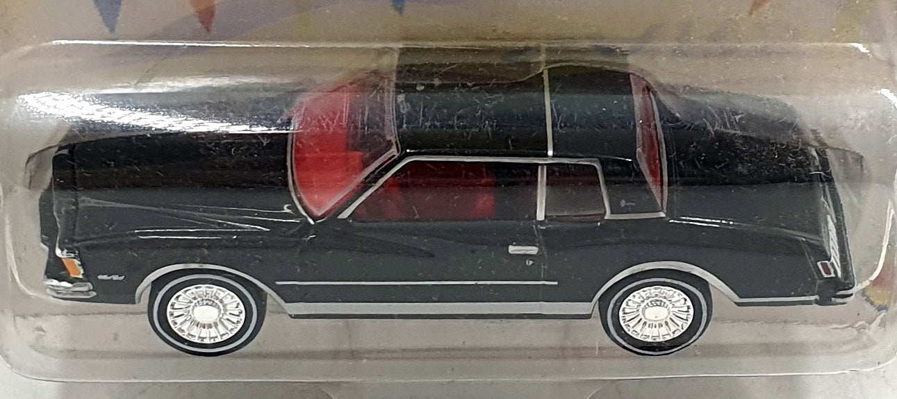 Johnny Lightning 1/64 JLMC028 - 1978 Chevrolet Monte Carlo - Black/Red Interior