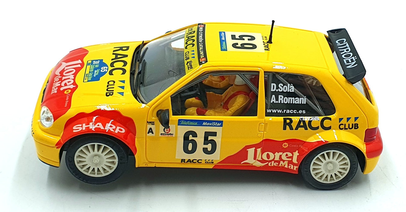 Ninco 1/32 Scale Slot Car 50266 - Citroen Saxo JWRC #65 "RACO" D.Sola