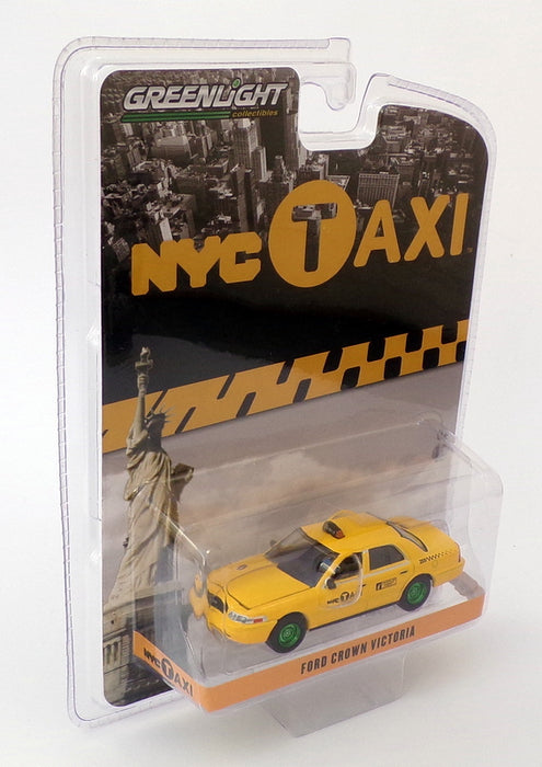 Greenlight 1/64 Scale 29773 - Ford Crown Victoria NYC Taxi Green Wheels - Yellow