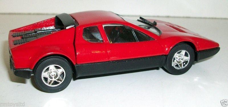 A Solido No. 129 Ferrari 2L 5 racing car comprising dark red body with A Solido No. 129 Ferrari 2L 5 racing car comprising dark red body with
