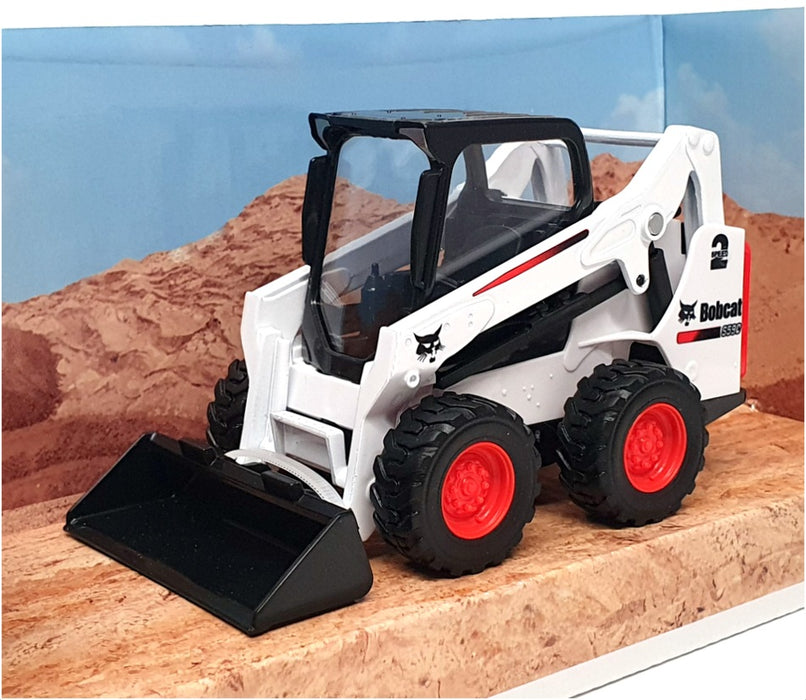 Burago 10cm Long 18-31801 Bobcat S590 Skid Steer With Bucket Motorized