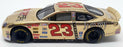 Racing Champions 1/24 Scale 95053 - Stock Car Ford  #23 J.Spence Nascar - Gold